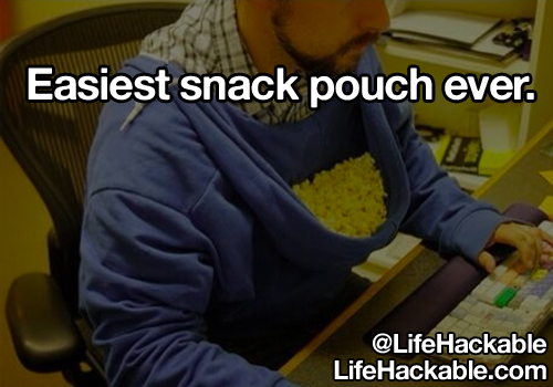Image: Someone wearing a hoody backwards, with the pulled-down hood full of popcorn. Image text: Easiest snack pouch ever.